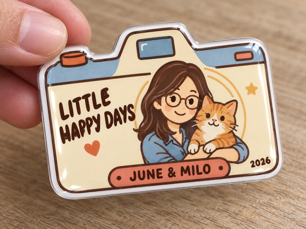 The photo reimagined as an illustrated acrylic magnet